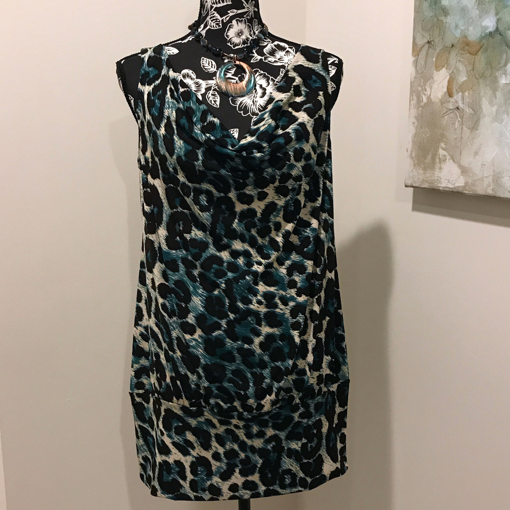 INC Be Abstract Top